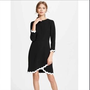 Shoshanna Sutter faux wrap dress in black with white scallop trim.